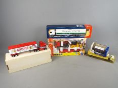 Joal, Matchbox, Tekno and others - Five boxed diecast vehicles in various scales.