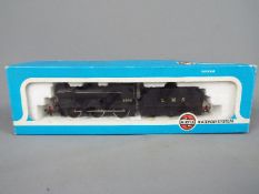 Airfix - an OO gauge locomotive and tender 4F Fowler, LMS black livery, op no 4454 # 54122-6,