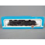 Airfix - an OO gauge locomotive and tender 4F Fowler, LMS black livery, op no 4454 # 54122-6,