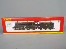 Hornby - an OO gauge locomotive and tender DCC Ready, Super Detail, BR standard 4MT black livery,