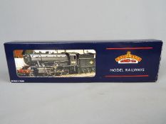 Bachmann - an OO gauge locomotive and tender BR black livery op no 90733,