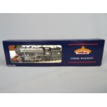 Bachmann - an OO gauge locomotive and tender BR black livery op no 90733,