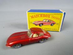 Matchbox by Lesney - E Type Jaguar, metallic red body, cream interior, grey plastic wheels # 32,