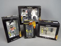 Minichamps Valentino Rossi Collection - four 1:12 scale figurines depicting Valentino Rossi,