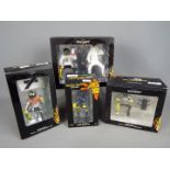 Minichamps Valentino Rossi Collection - four 1:12 scale figurines depicting Valentino Rossi,