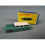 Matchbox by Lesney - American Ford Station Wagon, metallic green body with cream roof, grey wheels,