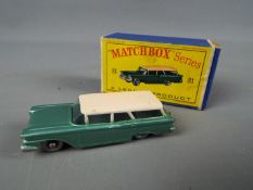 Matchbox by Lesney - American Ford Station Wagon, metallic green body with cream roof, grey wheels,