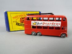 Matchbox, a Moko Lesney Product - London Trolleybus, red body, black poles, grey wheels # 56,