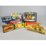 Corgi, Matchbox, Dinky Toys - A collection of eight boxed diecast vehicles.