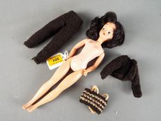 Pedigree Sindy - A dark brunette headed Sindy with painted eyebrows and lashes,