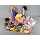 Fashion Dolls - A collection of fashion dolls to include Barbie, Disney and other.