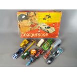 A boxed ‘Computacar’ battery powered programmable vehicle together with a collection of playworn