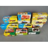 Corgi - Eleven boxed Corgi vehicles.