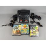 Sega - An unboxed Sega Mega Drive II games console, controller,