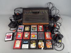 Atari - A vintage unboxed Atari CX-2600 Video Computer System with controllers,