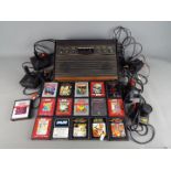 Atari - A vintage unboxed Atari CX-2600 Video Computer System with controllers,