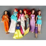 Disney - A collection of eight poseable Disney Dolls to include Ariel the Mermaid,