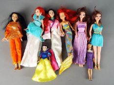 Disney - A collection of eight poseable Disney Dolls to include Ariel the Mermaid,