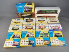 Corgi, Others - A collection of 18 diecast models of Trams by Corgi with 2 static models of trains.