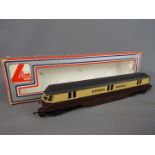 Lima - A boxed Lima OO gauge #205143MWG Express Parcels Railcar Op.No.34 in brown and cream livery.