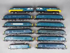 Bachmann, Hornby, Mainline - An unboxed assortment of 12 OO gauge diesel and electric locomotives.