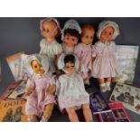 Dolls - A collection of predominantly female baby, jointed plastic dolls, approximately 60 cm (h),