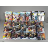 Playmates Star Trek - A collection of 21 carded collectable Star Trek Action Figures by Playmates