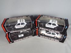 Motor Max - Four boxed 1:18 scale battery operated police vehicles with working lights / sirens.
