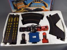 Scalextric - A boxed Scalextric Ford RS Cosworth Set, with a boxed Scalextric Accessory Set.