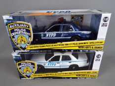 Greenlight - Two boxed Limited Edition 'NYPD' 1:18 scale diecast police cars.