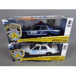 Greenlight - Two boxed Limited Edition 'NYPD' 1:18 scale diecast police cars.