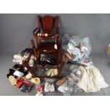 Doll's Accessories - A large collection of doll's shoes and a wooden doll's high chair and a large