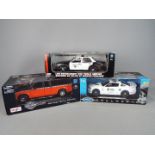 Motor Max, Welly, Maisto - Three boxed diecast 1:18 scale vehicles.