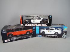 Motor Max, Welly, Maisto - Three boxed diecast 1:18 scale vehicles.