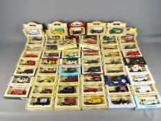 Lledo - A boxed collection of approximately 60 diecast vehicles by Lledo.