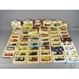 Lledo - A boxed collection of approximately 60 diecast vehicles by Lledo.