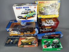 Tyco, Siku, Bburago, Humbrol and others - A mixed lot of boxed diecast models,
