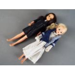 Pedigree Sindy - A pair of Pedigree Sindy dolls, a long blonde haired doll with painted eyebrows,
