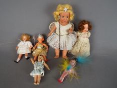 Dolls - A good collection of six vintage dolls to include a boxed composition girl doll dressed as