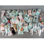 McDonalds Collectables - A collection in excess of 25 'Madame Alexander' dolls,