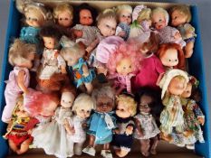 A collection in excess of twenty small collector dolls from the 1960's and 1970's to include