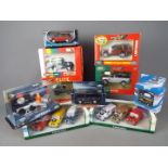Britains, Corgi, Cararama - A collection of 9 boxed diecast 'Land Rover' vehicles in several scales.