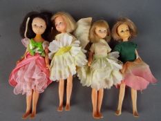 Hornby Flower Fairies Dolls - A collection of four Flower Fairy Dolls dressed in clothing.