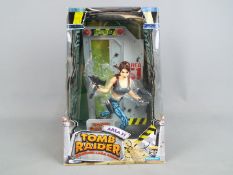 Playmates - A boxed, and collectable 'Tomb Raider with Lara Croft in Area 51' figure by Playmates.