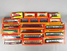 Hornby - A collection of 17 OO gauge coaches and wagons by Hornby.