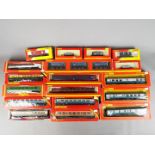 Hornby - A collection of 17 OO gauge coaches and wagons by Hornby.