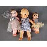 Kewpie Dolls - A collection of three Kewpie Dolls to include a celluloid female doll with jointed