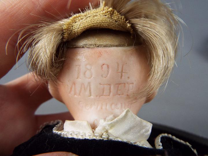 Armand Marseille - a bisque headed female doll with hand painted eyebrows eyelashes and lips with - Image 3 of 6