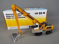 NZG - A boxed diecast 1:50 scale NZG #810 Liebherr LH80M Litronic Excavator.