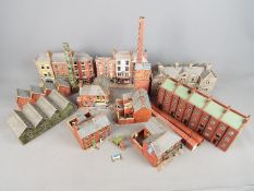 A small collection of OO Gauge railway plastic and cardboard layout buildings and accessories